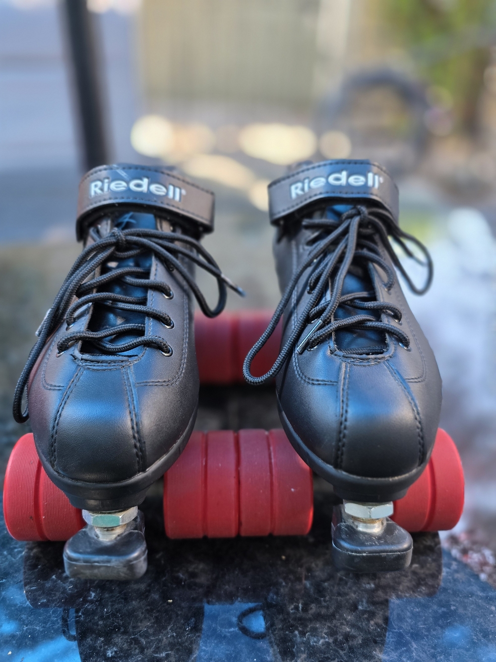 Riedel Black Skate Boot with Red Wheels